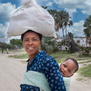 Woman carrying child